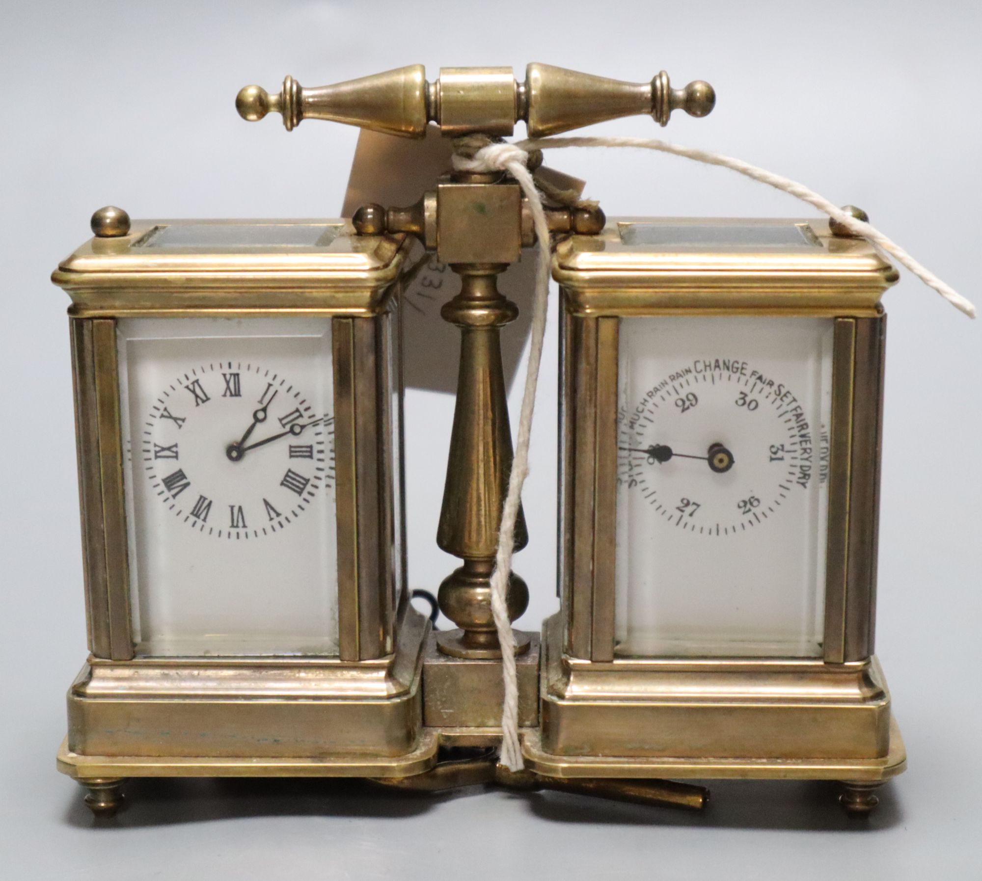 A brass miniature carriage clock/ barometer